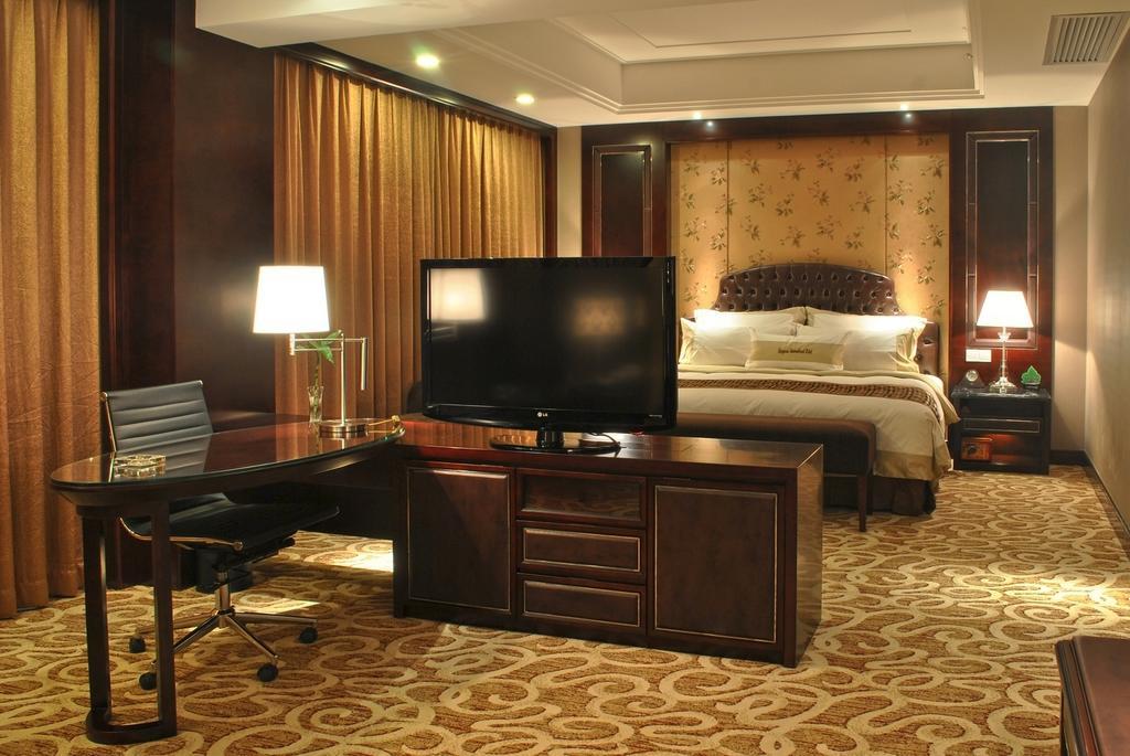 Qingyuan International Hotel Quarto foto